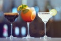 Row of different fresh alcoholic cocktails on counter Royalty Free Stock Photo