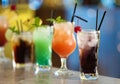 Row of different fresh alcoholic cocktails on counter Royalty Free Stock Photo