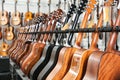 Row of guitars in music store Royalty Free Stock Photo