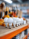 A row of different LED light bulbs on a shelf, offering energyefficient lighting solutions. Concept of innovation, choice, and Royalty Free Stock Photo