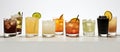 a row of different types of drinks are lined up on a table Royalty Free Stock Photo