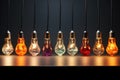 row of different wattage light bulbs