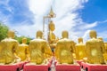 Row of disciple statues surrounding big buddha statue in public to the general public worship worship of, Thailand Royalty Free Stock Photo