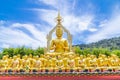 Row of disciple statues surrounding big buddha statue in public to the general public worship worship, Thailand