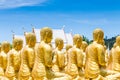 Row of disciple statues surrounding big buddha statue in public to the general public worship worship Royalty Free Stock Photo