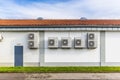 Row of Dual Inverters, combination of heating and cooling pump, installed on industrial building