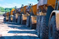 Row of dump trucks