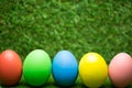 Row of Easter eggs on grass Royalty Free Stock Photo
