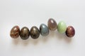Row of Easter eggs made of precious stones
