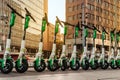 Row of electric E scooters , escooter or e-scooter of the company LIME