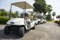 row of electric golf carts Royalty Free Stock Photo