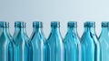 Row of empty blue glass bottles Royalty Free Stock Photo