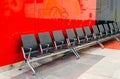 row of empty chairs at airport. Empty waiting room in the departure area Royalty Free Stock Photo