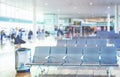 Row of empty chairs in the departure lounge of an international airport Royalty Free Stock Photo