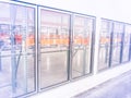 Row of empty commercial fridges at wholesale big-box store Royalty Free Stock Photo