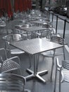 Row of empty metal tables and chairs Royalty Free Stock Photo