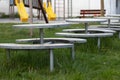 Row of empty outdoor tables and benches