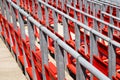 Row of empty red seats in a sports stadium Royalty Free Stock Photo