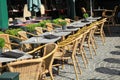The row of empty tables with menu on pavement Royalty Free Stock Photo