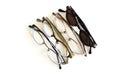 Row of eyeglasses and sunglasses isolated on white Royalty Free Stock Photo