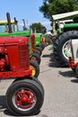 Row of Farmall and John Deere tractors Royalty Free Stock Photo