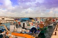 A row of fishing boats in a Cypriot harbor.