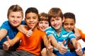 A row of five happy kids Royalty Free Stock Photo