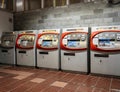 Row of five Spanish Barcelona train ticket vending machines
