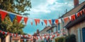 A row of flags hanging from a building Royalty Free Stock Photo