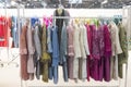 A row of formal jackets and dresses at Momad 2023 Madrid Spain