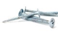 A row of four screws with a pointed top Royalty Free Stock Photo