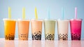 Row of fresh boba bubble tea glasses on a table Royalty Free Stock Photo