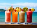 Row of fresh fruit juice cocktail beverage on beach with seascape background.Generative AI Royalty Free Stock Photo