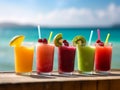 Row of fresh fruit juice cocktail beverage on beach with seascape background.Generative AI Royalty Free Stock Photo