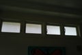 Row Frosted Clerestory Windows Above Interior Artwork Royalty Free Stock Photo