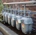 Row of gas meters with full manifolding Royalty Free Stock Photo