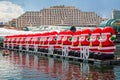 Row of gigantic inflatable santas