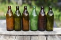 Row of glass colored bottles