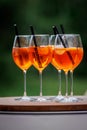 The row of glasses with Aperol Spritz summer cocktail Royalty Free Stock Photo