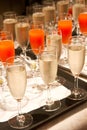 Row of glasses filled with champagne