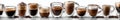 A row of glasses filled with different types of coffee Royalty Free Stock Photo
