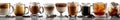 A row of glasses filled with different types of coffee Royalty Free Stock Photo