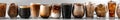 A row of glasses filled with different types of coffee Royalty Free Stock Photo