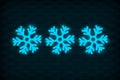 Row of glowing frozen snowflakes on dark wall. Neon effect. Large snowfalls in winter