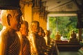 A row of golden buddha statue at Wat Intharam Kanchanaburi, Thai Royalty Free Stock Photo