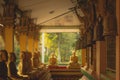 A row of golden buddha statue at Wat Intharam Kanchanaburi, Thai Royalty Free Stock Photo