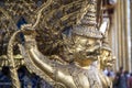 Row of golden Garuda are beautifully decorated on the walls of the Emerald Buddha temple in Grand Palace Royalty Free Stock Photo