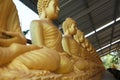 Row of golden seated buddhas Royalty Free Stock Photo