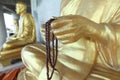 Row of golden seated buddhas Royalty Free Stock Photo