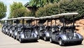 Row of golf carts or buggies Royalty Free Stock Photo